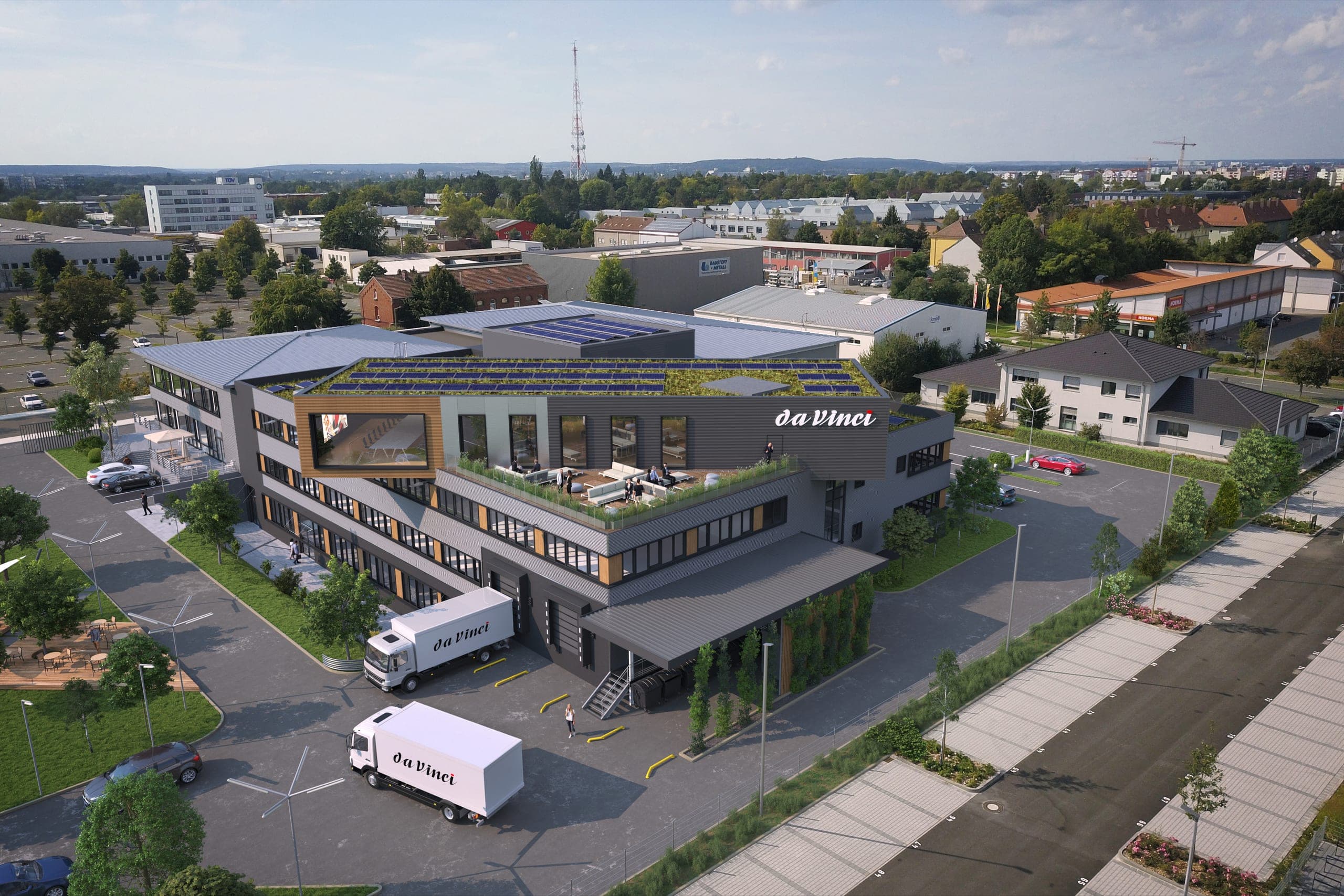 Visualisierung des Neubaus aus der Luft mit begrünter Dachterrasse und Lkw an der Anlieferung