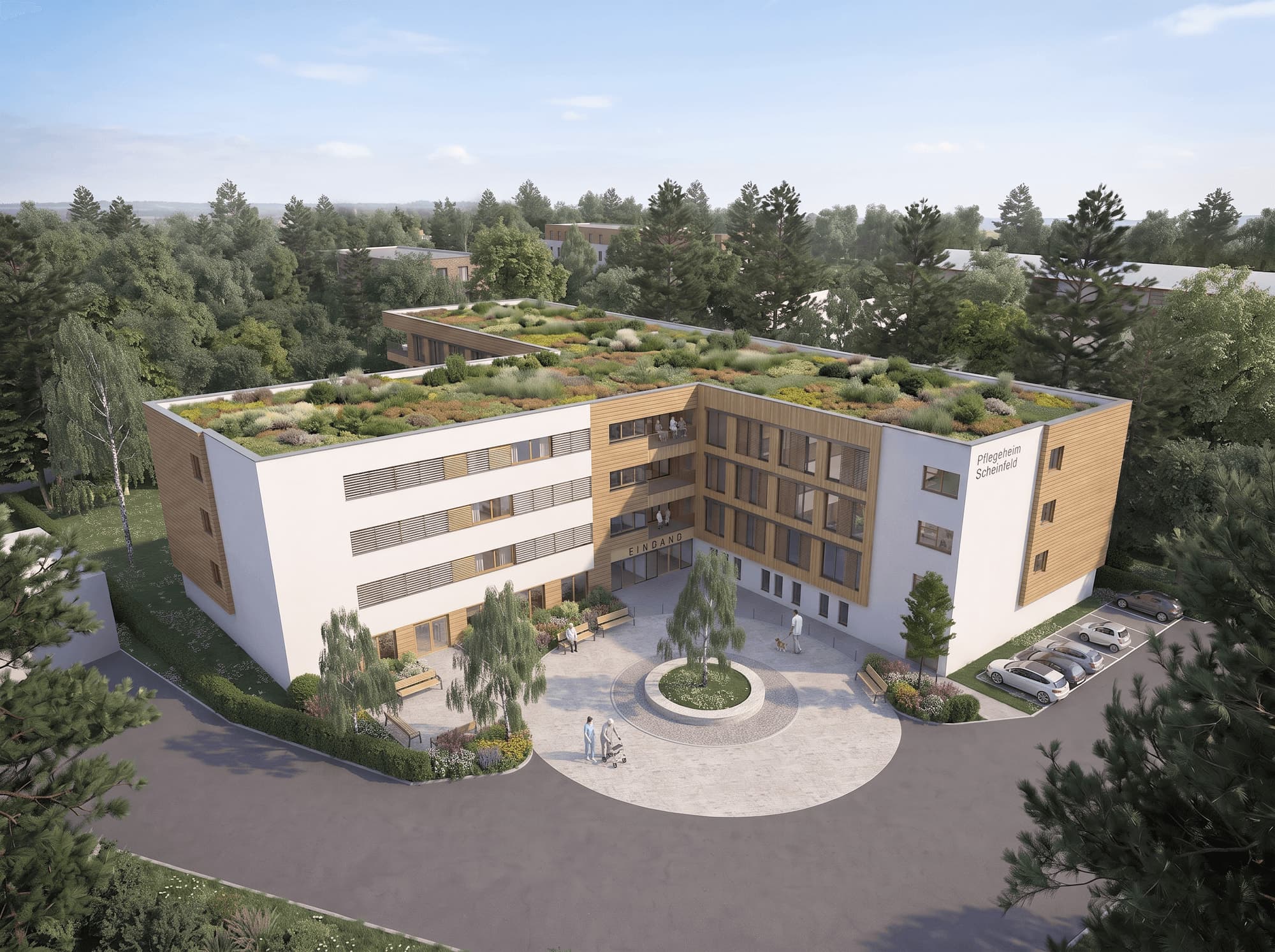 Aerial visualisation of the T-shaped care home with a green roof and circular entrance court