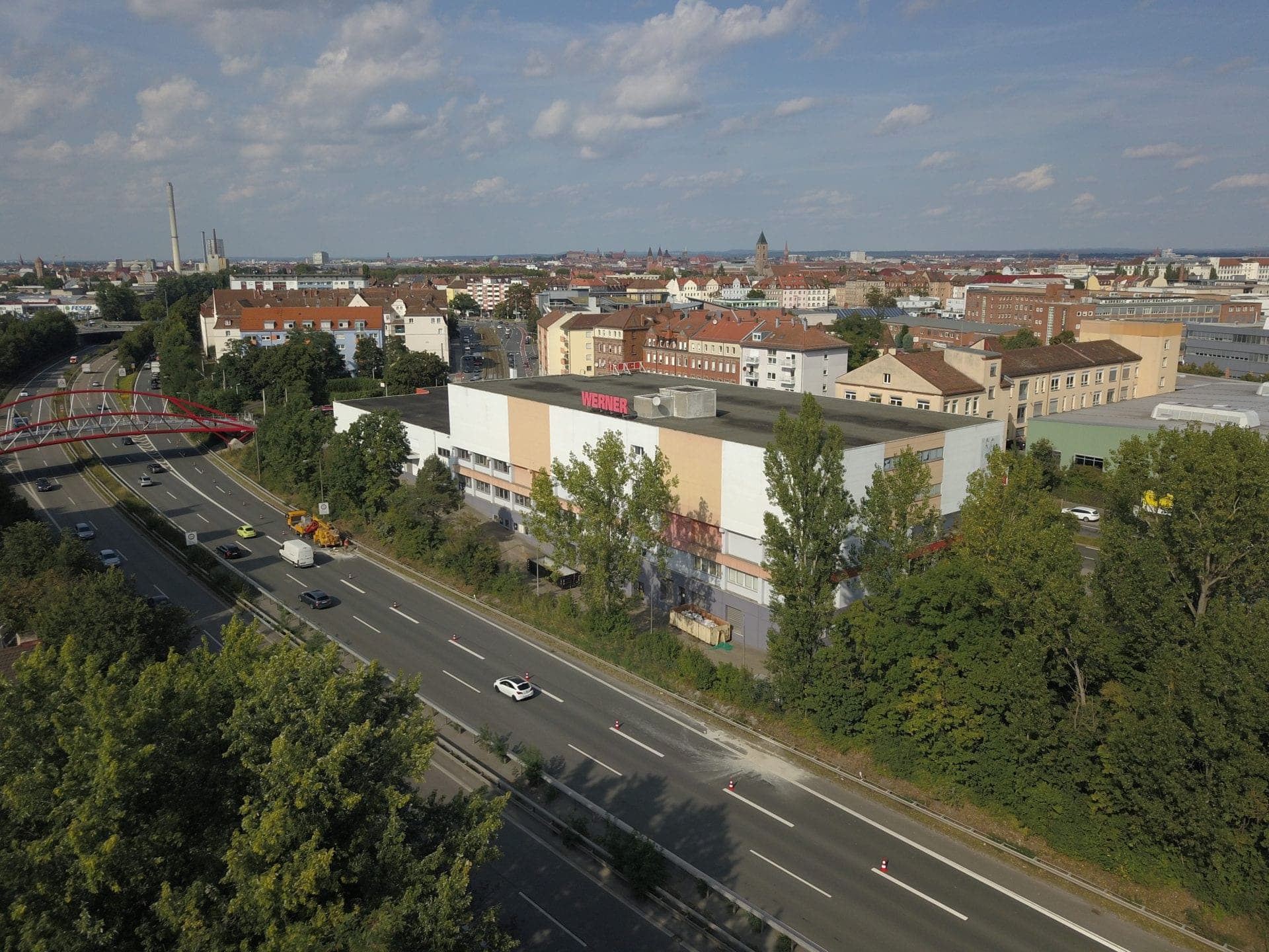 Aerial view of the former Werner furniture store beside the urban motorway prior to conversion