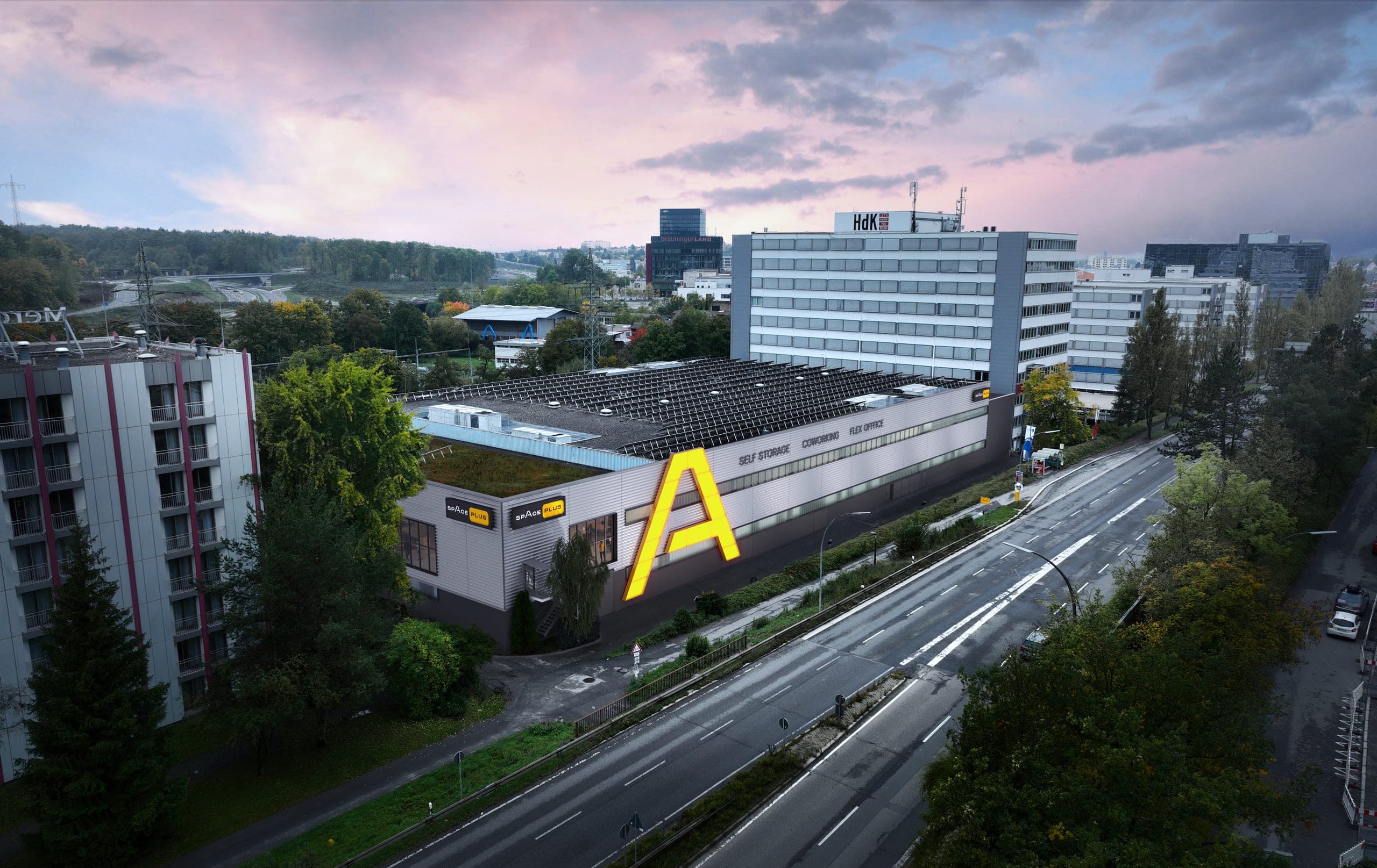 Self storage for Space Plus in Sindelfingen, aerial visualisation of the converted exhibition hall with a large yellow A