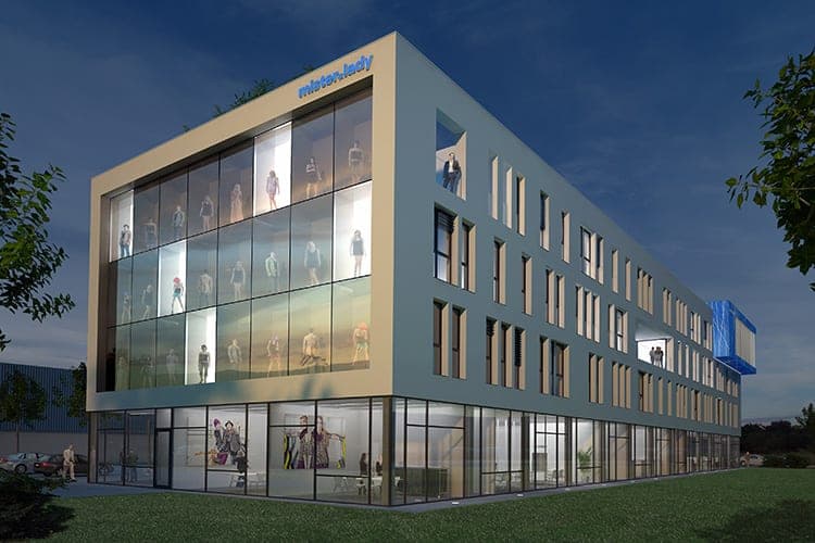 Corporate headquarters for mister*lady in Schwabach, night-time visualisation with an illuminated shop-window façade